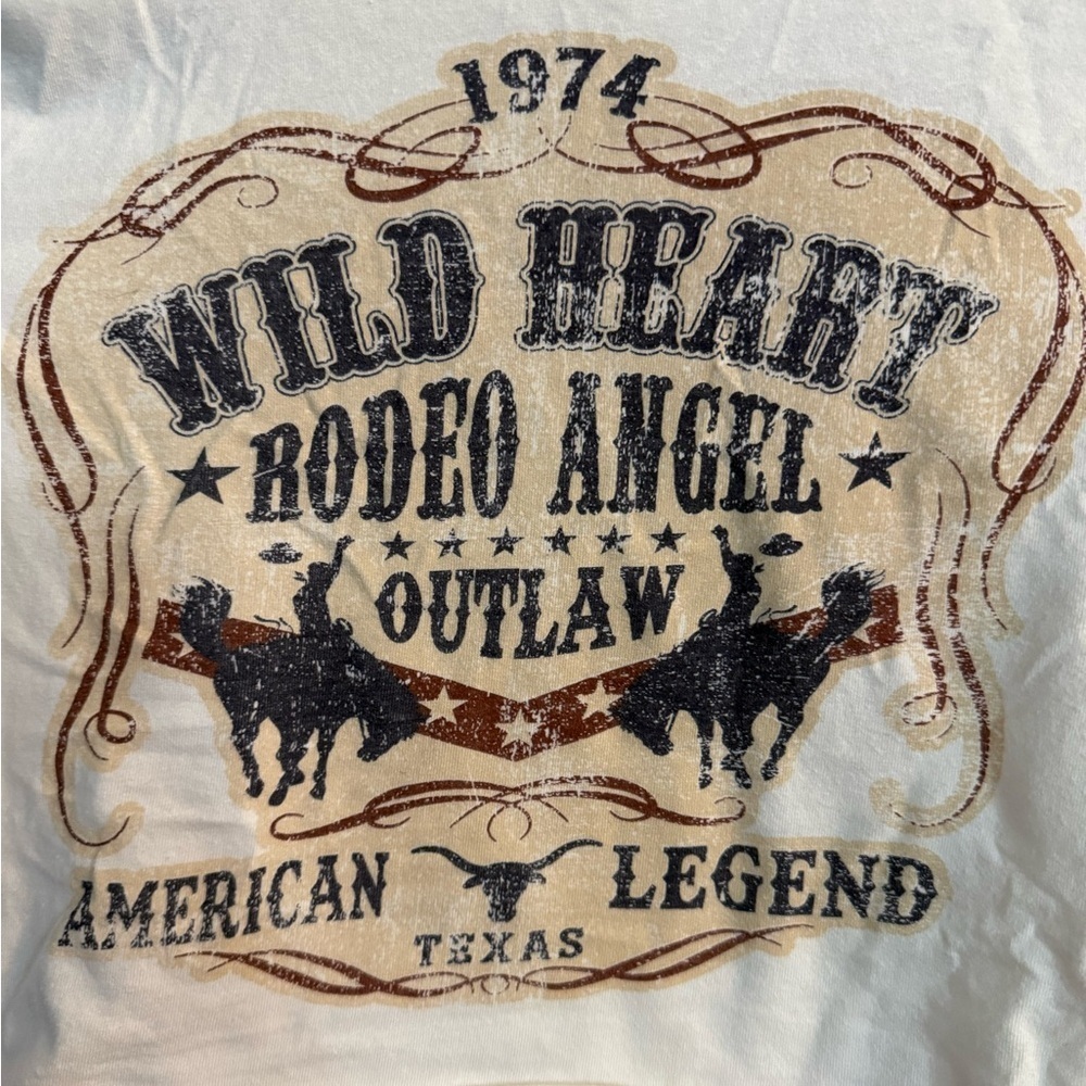 January 7 Wild Heart Rodeo Angel Outlaw
American Legend Texas Crop Top - Picture 2 of 4